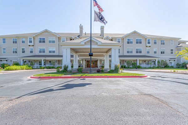 Building front entrance and covered driveway at Bear Creek Senior Living