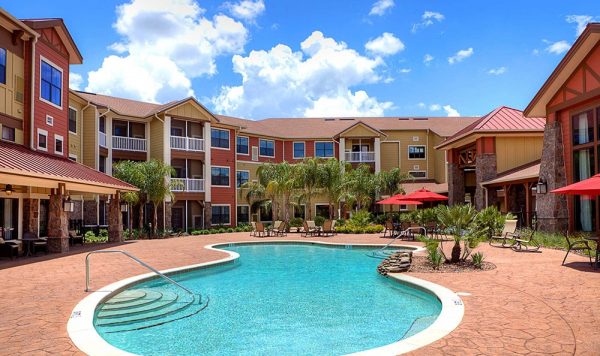 Swimming pool and outdoor area at American House Senior Living Communities