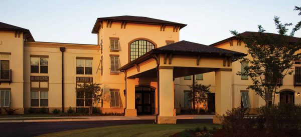 The Blake at Malbis building front and covered driveway and entrance
